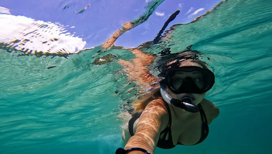 Jan snorkeling in clear Caribbean water